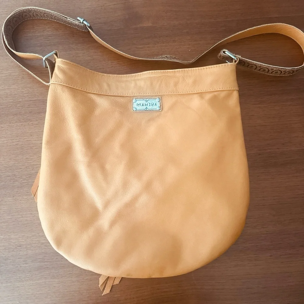 Mahiya Leather Tan Fringe Shoulder Bag with Floral Hand Tooling and Stone Inlay
